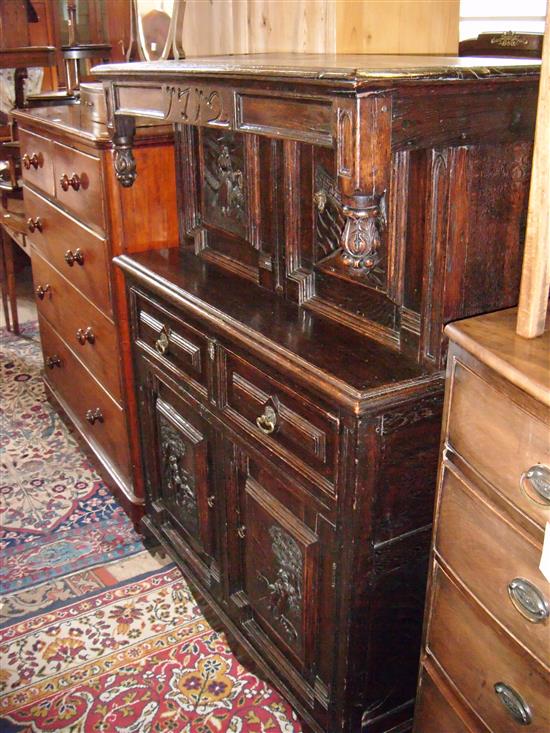 Small dark oak carved court cupboard